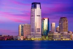 Exchange Place, Jersey City, New Jersey, USA skyline on the Hudson River.